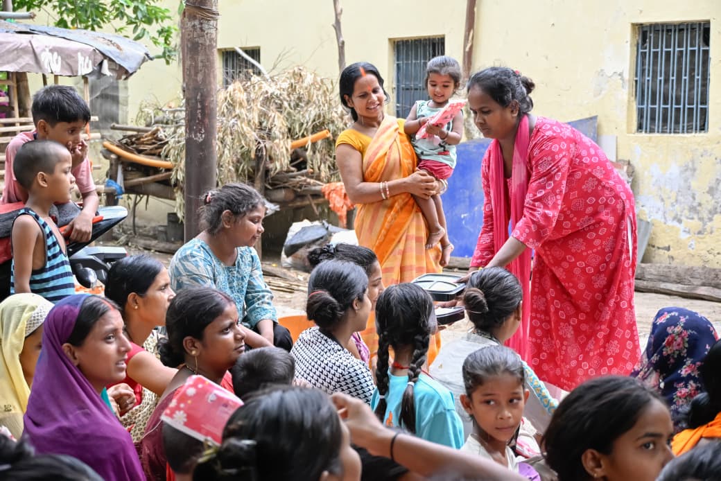 Sanitary napkin packs being distributed in the Bihar village drive
