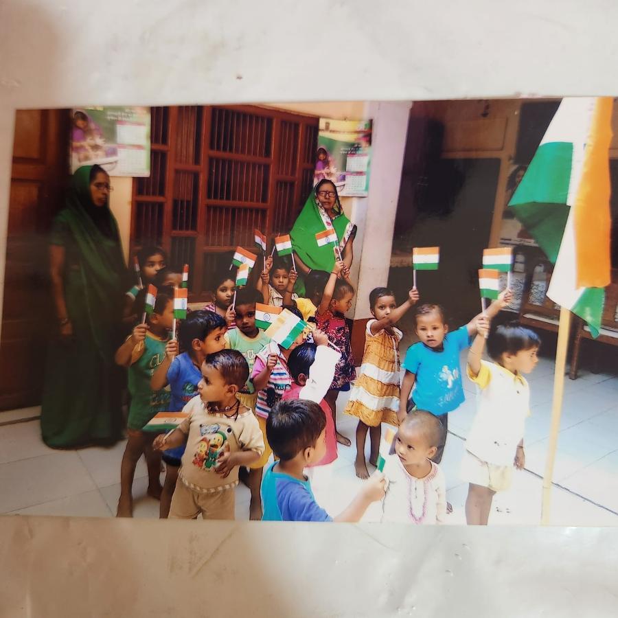 Kishori Diwas flag ceremony, faces blurred for privacy
